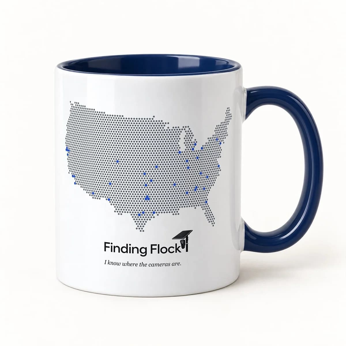 Finding Flock Accent Mug in Navy, the 11oz mug at a three-quarter angle